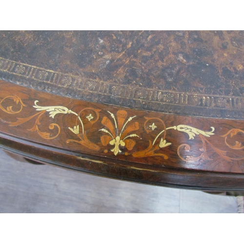 7599 - A 19th Century rosewood veneer desk inlaid with scrolled marquetry including ivory, cut glass mirror... 