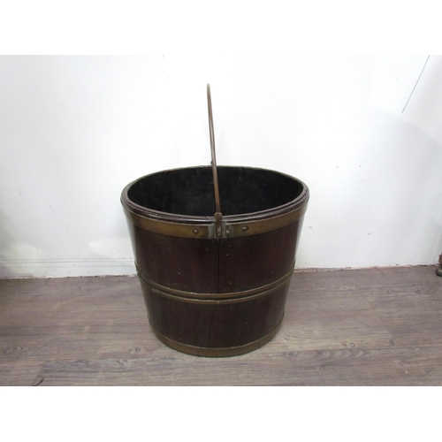 7605 - A 19th Century bentwood bucket with brass banding, 32cm high