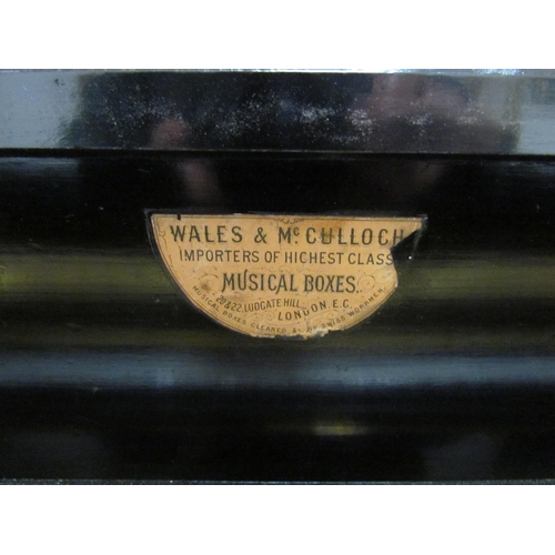 7646 - A Wales & McCullock music box playing 8 airs, three part comb, 44, 45, 35, cylinder 44cm long    (R)... 