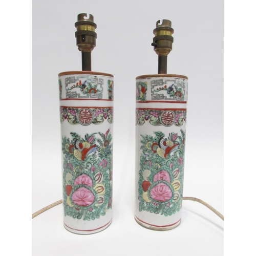 7011 - A pair of 20th Century Canton cylindrical lamps 33cm tall without shades