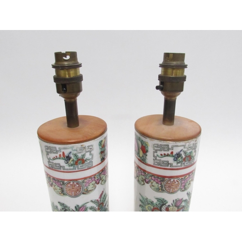 7011 - A pair of 20th Century Canton cylindrical lamps 33cm tall without shades