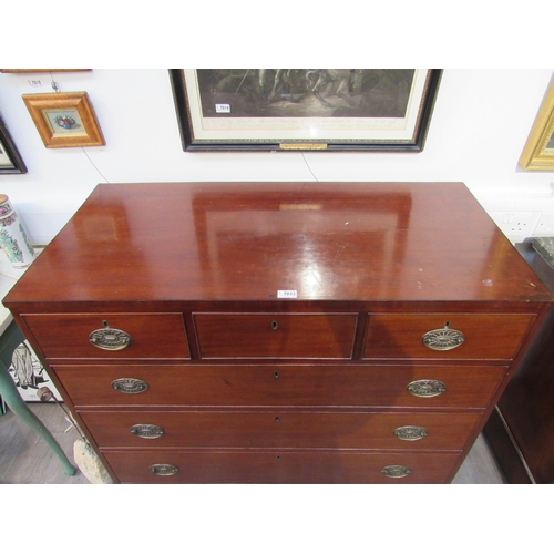 7022 - A Regency mahogany chest of three over three drawers with embossed oval plate handles, shaped apron,... 