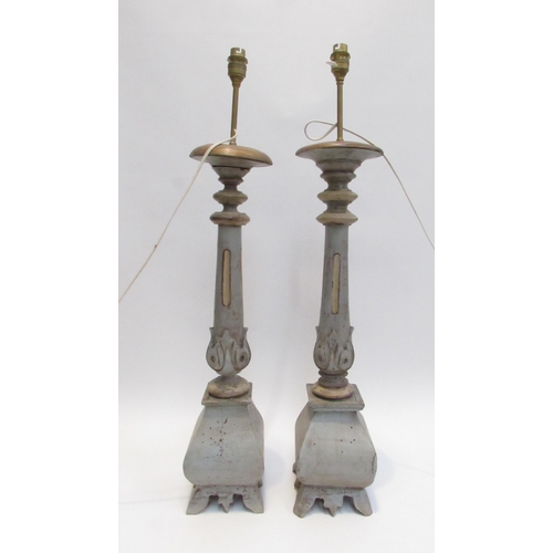 7039 - A pair of carved wood painted tall lamps with slender bodies to bulbous bases,78cm tall