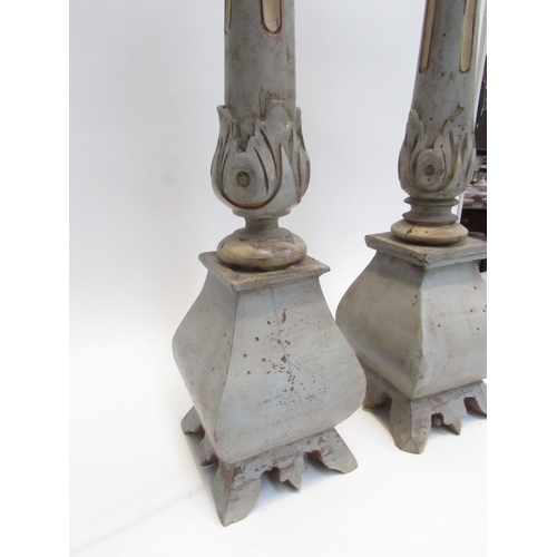 7039 - A pair of carved wood painted tall lamps with slender bodies to bulbous bases,78cm tall