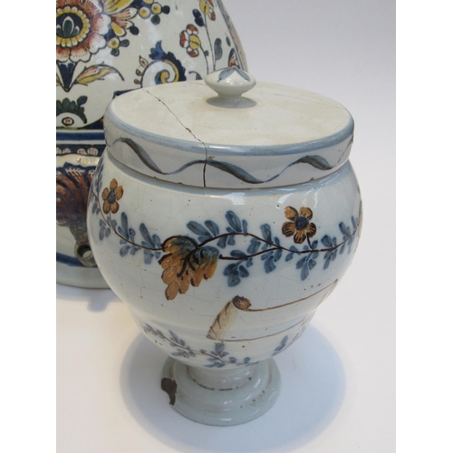 7052 - A 19th Century French Faience wall cistern/fountain decorated with dolphin and flowers.  Two lidded ... 