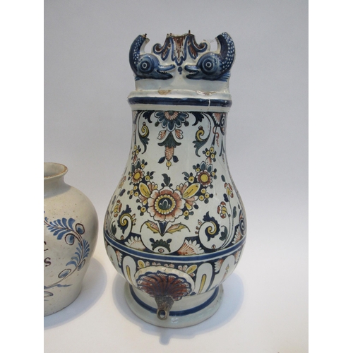 7052 - A 19th Century French Faience wall cistern/fountain decorated with dolphin and flowers.  Two lidded ... 