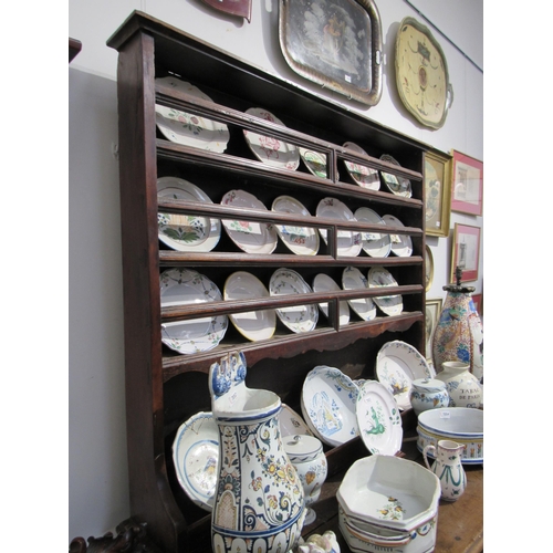 7055 - A 19th Century French walnut dresser with plate rack above two fielded panel door base, 220cm tall x... 