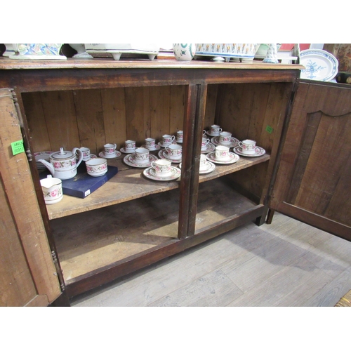 7055 - A 19th Century French walnut dresser with plate rack above two fielded panel door base, 220cm tall x... 