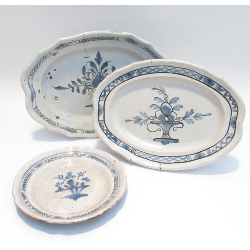 7065 - Three 19th Century French Faience serving plates with black bottoms all with cracks and chips, two s... 