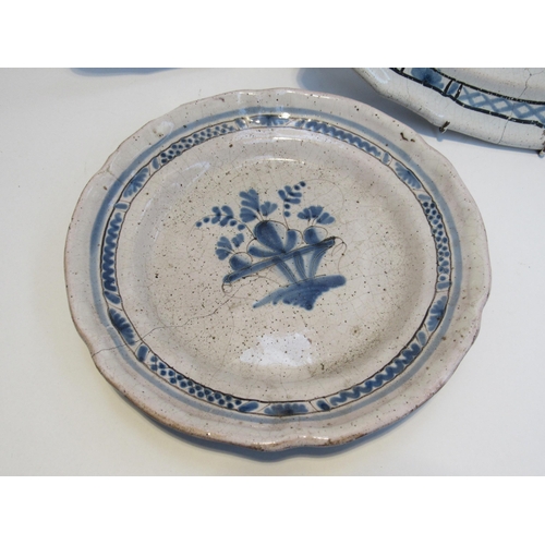 7065 - Three 19th Century French Faience serving plates with black bottoms all with cracks and chips, two s... 