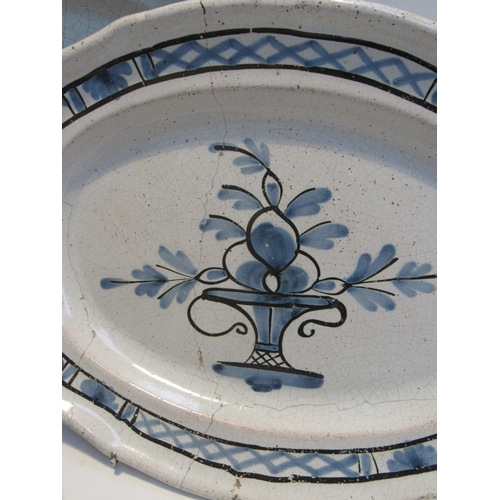 7065 - Three 19th Century French Faience serving plates with black bottoms all with cracks and chips, two s... 