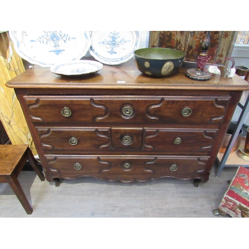 7066 - WITHDRAWN: A 19th Century French walnut chest of three long drawers with carved detail to drawer fro... 