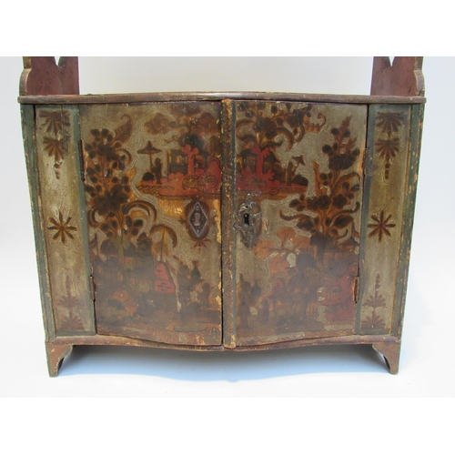 7067 - A Georgian painted wall hanging shelf with cupboard, chinoiserie decoration, 75cm x 46cm x 17cm