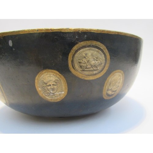 7069 - A papier mache bowl decorated with modern cameo style prints, 11.5 cm x 26.5 cm diameter