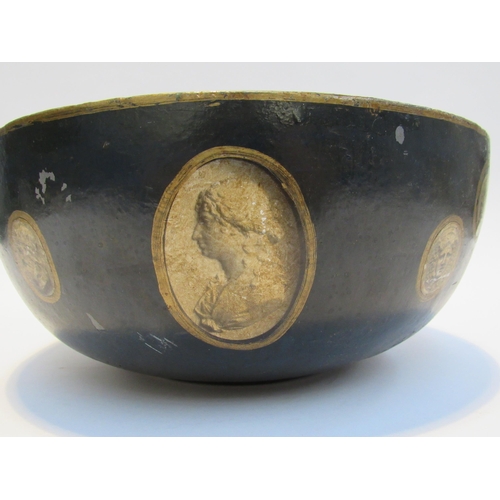 7069 - A papier mache bowl decorated with modern cameo style prints, 11.5 cm x 26.5 cm diameter