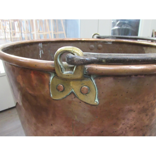 7081 - A large copper copper with wrought metal handle, 40cm tall x 59cm diameter   (R) £150 ARCH SALE