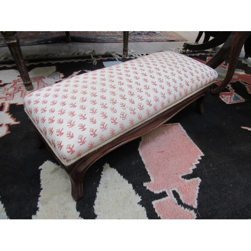 7109 - WITHDRAWN: A late 19th Century walnut rectangular footstool with needlework upholstery. 18.5cm x 60c... 