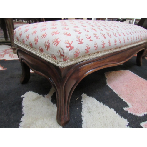 7109 - WITHDRAWN: A late 19th Century walnut rectangular footstool with needlework upholstery. 18.5cm x 60c... 