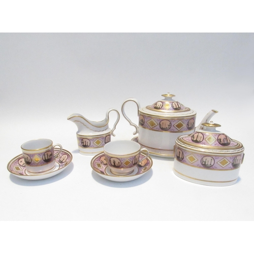 7111 - A circa 1800 English porcelain coffee and tea set decorated with ancient monuments gilt embellishmen... 