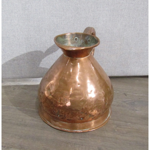 7154 - A Victorian copper four gallon jug, two gallon jug and a one gallon jug (dented), 42cm, 29cm & 26cm ... 