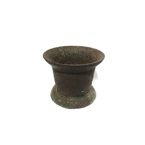 7158 - A large cast iron Georgian pestle and mortar.  The pestle with the ward cannon on the handle.  Pestl... 