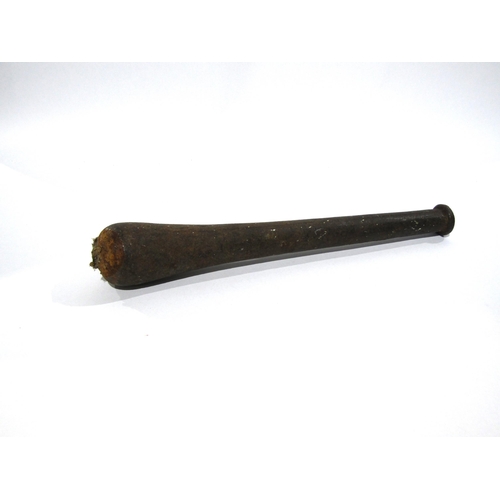 7158 - A large cast iron Georgian pestle and mortar.  The pestle with the ward cannon on the handle.  Pestl... 