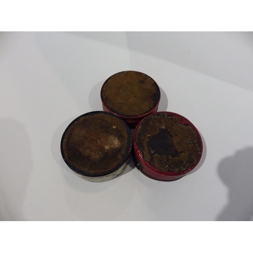 7193 - Three Regency papier-mache wine bottle coasters circa 1820, two red one black decorated with flowers... 