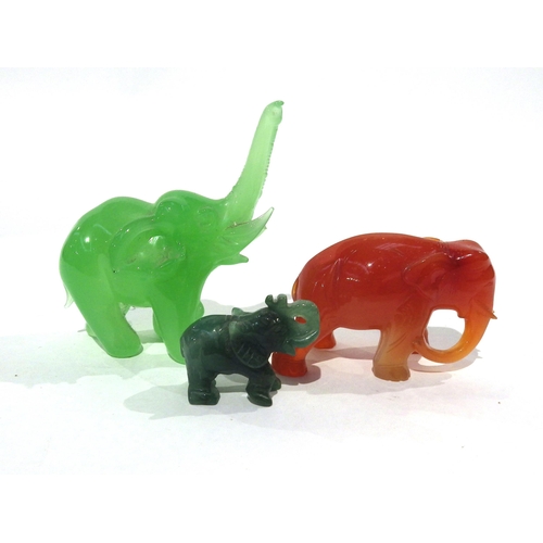 7194 - Three carved polished stone elephants possibly Jade (3)