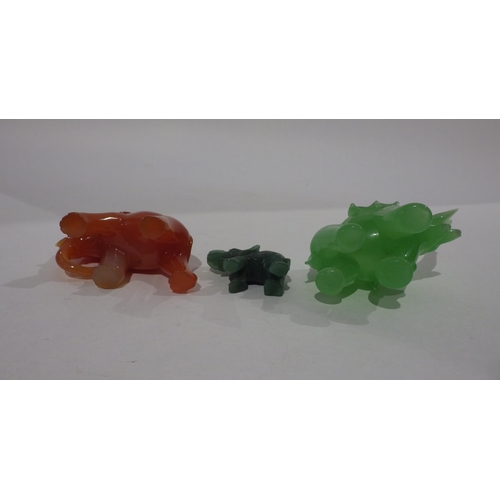 7194 - Three carved polished stone elephants possibly Jade (3)