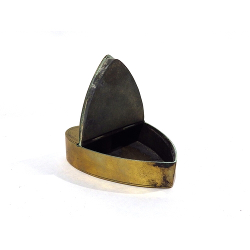 7196 - A Georgian brass candlestick and Georgian brass heart form snuff box, 16.5cm tall and 8.3cm long 
(2... 