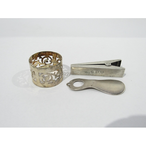 7223 - A 925 silver miniature shoe horn, filigree case, plated peg note holder and plated napkin ring. The ... 