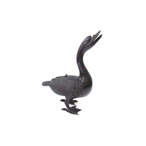 7615 - A Japanese Meiji period archaic style bronze ‘duck’ censer and cover, 35cm tall