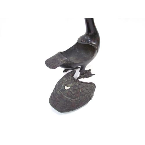 7615 - A Japanese Meiji period archaic style bronze ‘duck’ censer and cover, 35cm tall