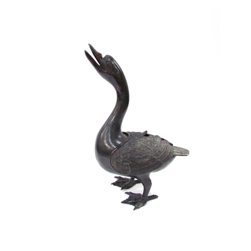 7615 - A Japanese Meiji period archaic style bronze ‘duck’ censer and cover, 35cm tall