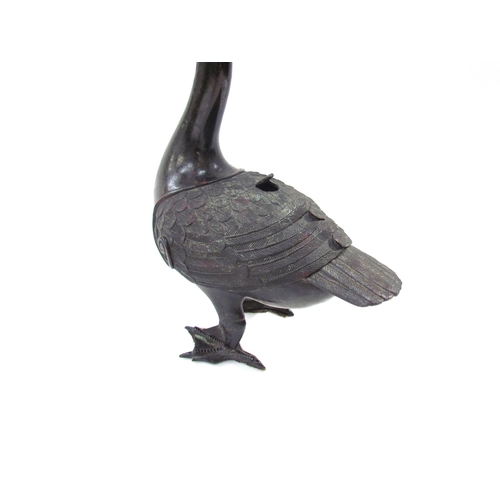 7615 - A Japanese Meiji period archaic style bronze ‘duck’ censer and cover, 35cm tall