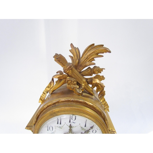 7616 - An early 19th Century French Ormolu mantel clock with white enamel dial, Arabic numerals with two tr... 