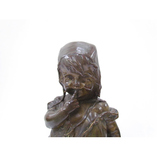 7617 - JUAN CLARA AYATS (1875-1958): A bronze sculpture of young girl standing on a rush seated stool, hold... 