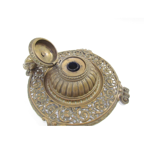 7633 - A Victorian pierced brass desk inkwell with owl on crescent moon lid, scrolled foliate detail, 21.5c... 