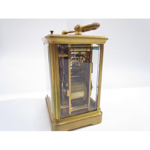 7637 - A carriage clock striking on the hour , with key