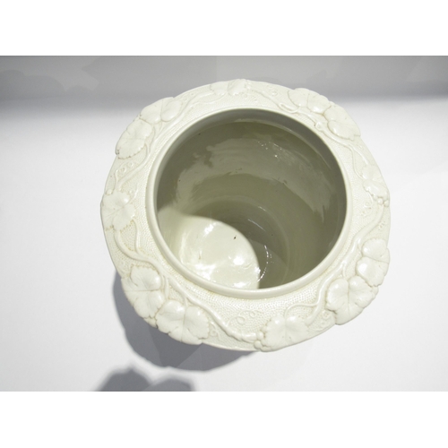 7729 - A Victorian Parian ware George Simpson’s Patent wine cooler, white porcelain, all over grape and vin... 