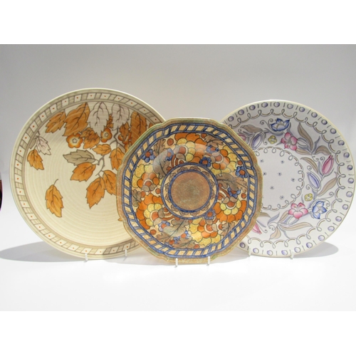 7730 - Two Charlotte Rhead chargers and a plate varying designs including orange foliate pattern 4921 for C... 