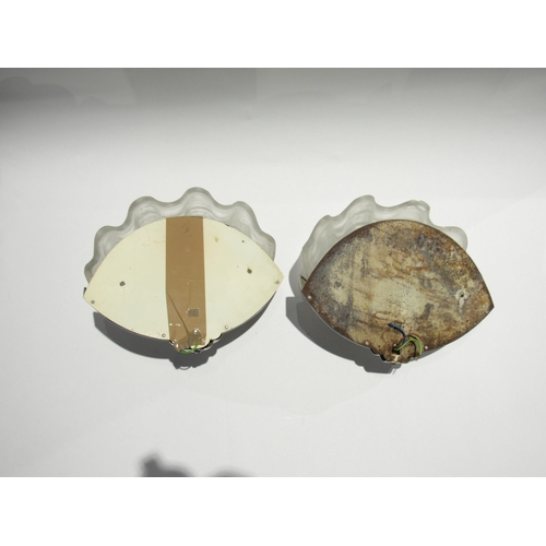 7735 - A pair of Art Deco wall lights, frosted shell shaped glass shades