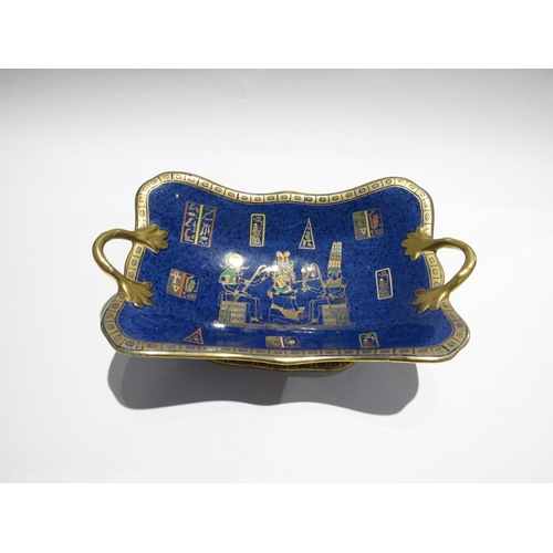 7736 - A Carlton Ware boat shaped twin handled bowl depicting Egyptian scenes, gilt embellishment, 30cm lon... 