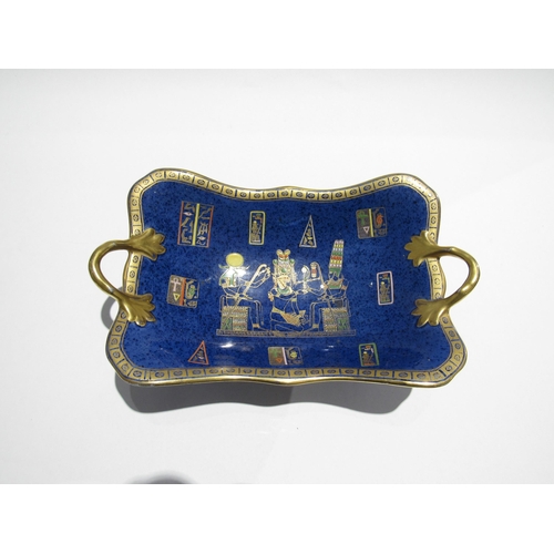 7736 - A Carlton Ware boat shaped twin handled bowl depicting Egyptian scenes, gilt embellishment, 30cm lon... 