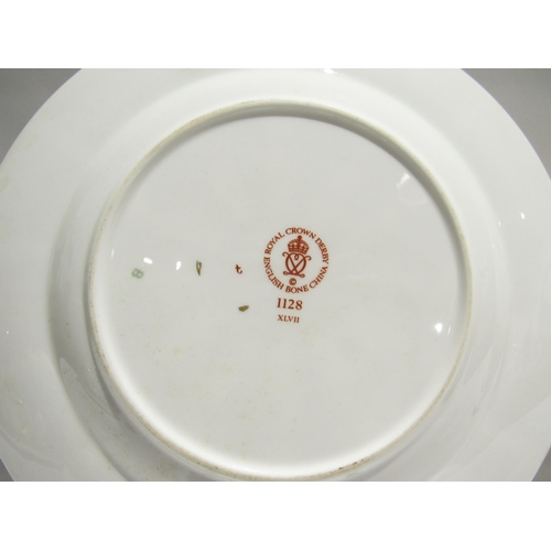 7738 - A quantity of Royal Crown Derby Imari palette ceramics to include cups, saucers, plates, pin dish et... 