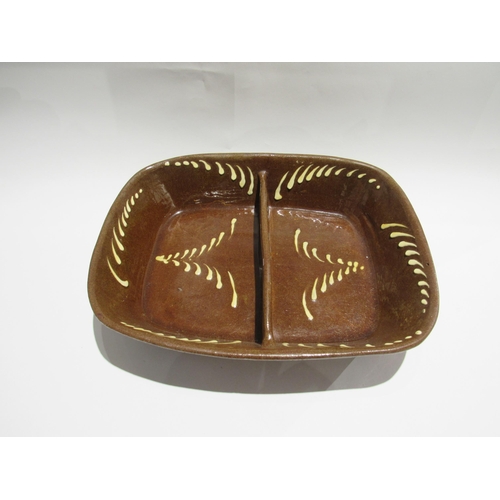 7741 - A slipware two section dish, 39cm wide