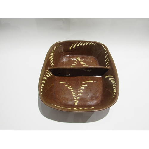 7741 - A slipware two section dish, 39cm wide