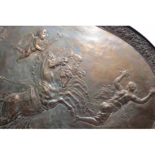 7764 - A circa 1900 copper oval tray of large proportions, repousse Romanesque chariot scene, 106cm x 63.5c... 