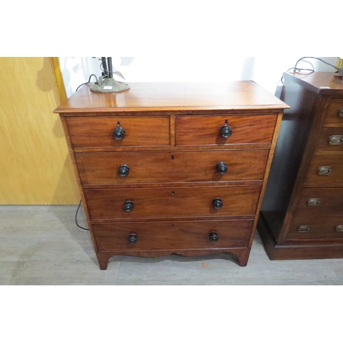 7767 - A Victorian flame mahogany chest of two short over three graduating long drawers with turned handles... 