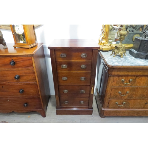 7770 - A Victorian walnut five drawer Wellington chest (the locking bar with key) over a plinth base, 107cm... 